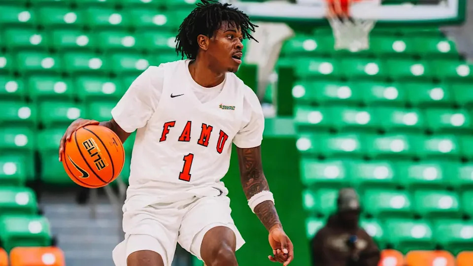 Florida A&M Rattlers guard Antonio Baker Jr. handles the basketball during a NCAA game versus the Albany State Golden Rams at the Al Lawson Jr. Multipurpose Center in Tallahassee, Florida, Monday, Dec. 15, 2025. The Rattlers defeated the Golden Rams 93-77.