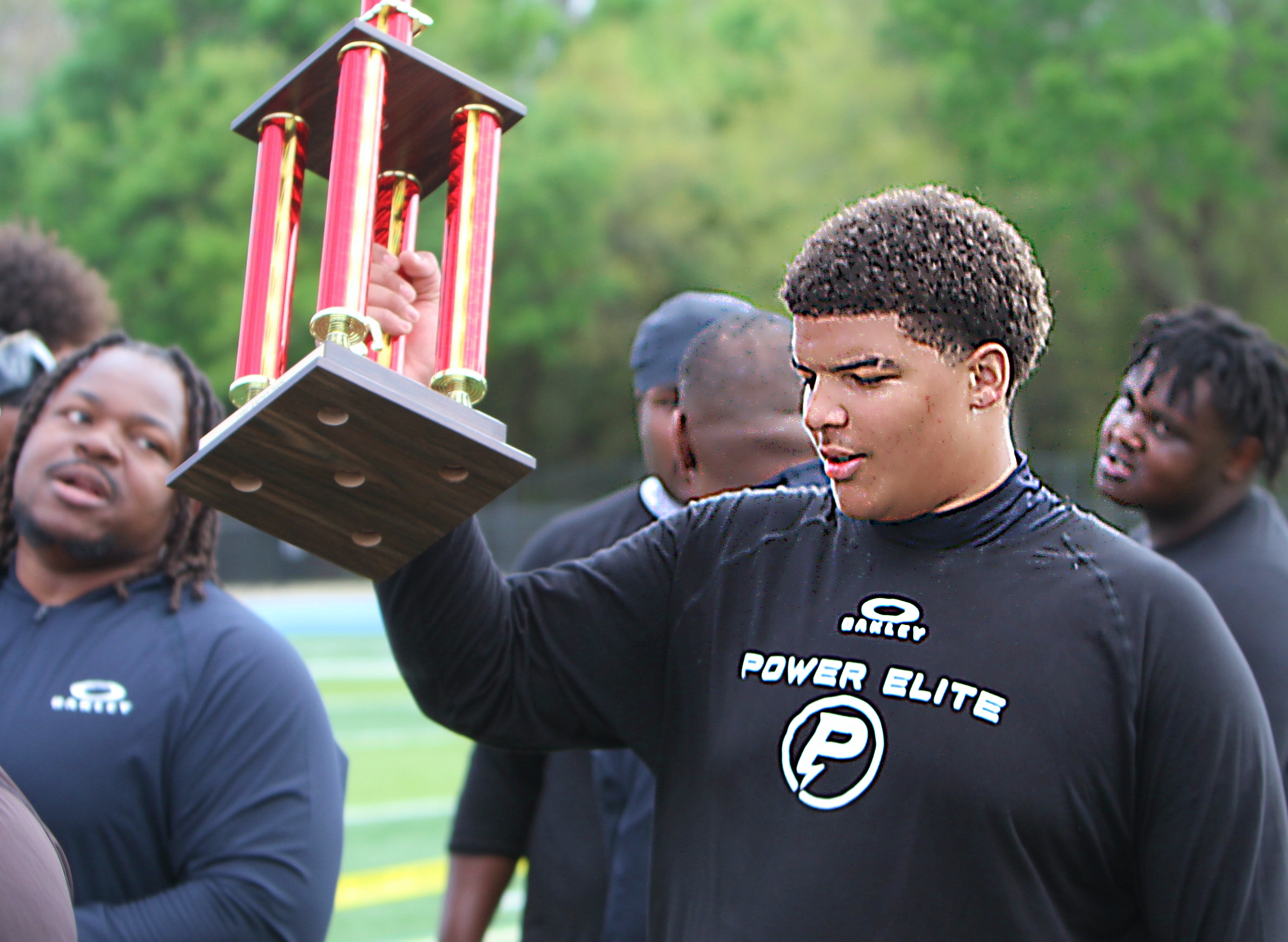 Carrollwood Day 2028 two-way lineman Antonio Thomas Jr. holds up...