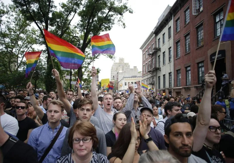 Thousands of people gather around the Stonewall Inn in New York City at a memorial for the victims of the mass shooting at Pulse Nightclub in Orlando, Fla, in June 2016. File Photo by John Angelillo/UPI