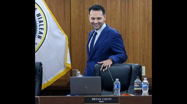 Hialeah Mayor Bryan Calvo takes his seat as he attended his first city council meeting on Tuesday, Jan. 13, 2026, at City Hall in Hialeah, Florida.