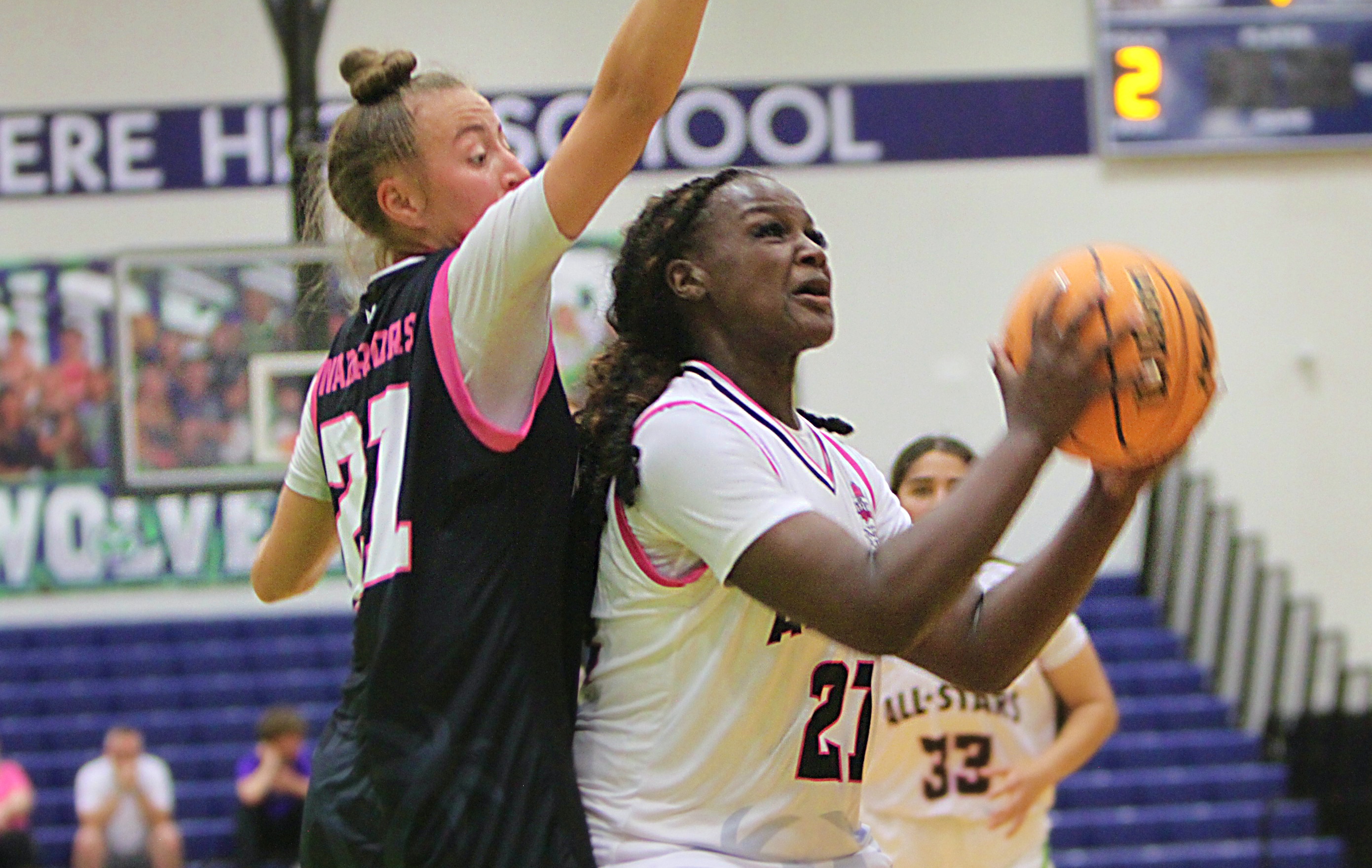 Zoe Corjay of Horizon tries to stop Eryn Griffin of...