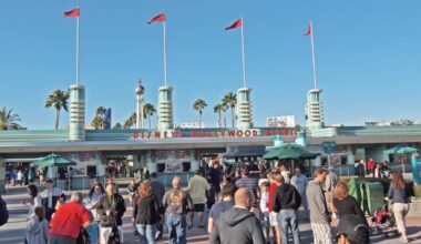 Guests stream into Disney's Hollywood Studios through the main entrance.
