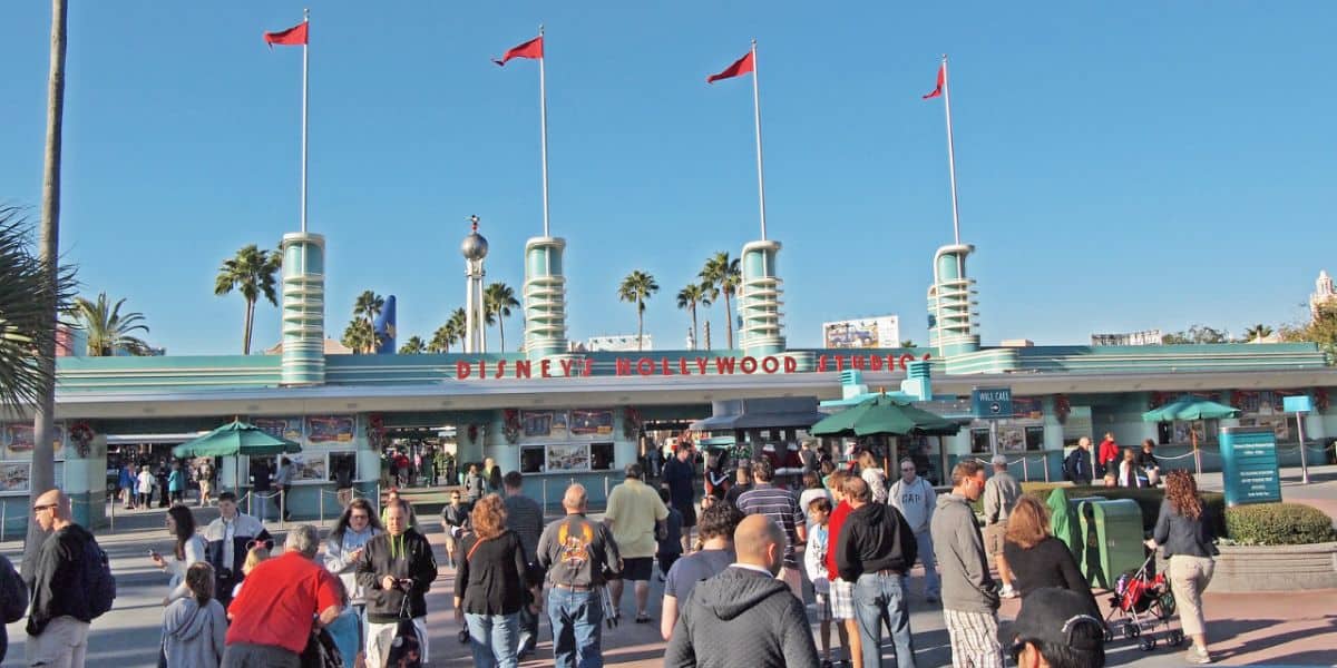 Guests stream into Disney's Hollywood Studios through the main entrance.