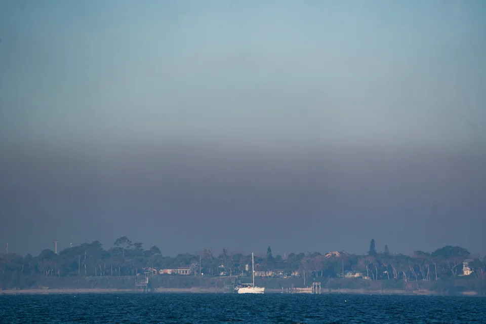 Smoke from a mulch fire is seen looking west from Hutchinson Island just south of the nuclear power plant in St. Lucie County on March 24, 2026.