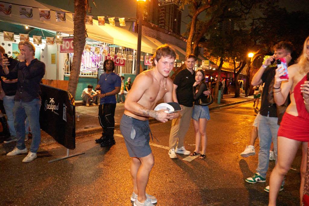 A spring breaker can’t seem to keep his shirt on during a night out in Fort Lauderdale, Florida. Romaine Maurice for NY Post