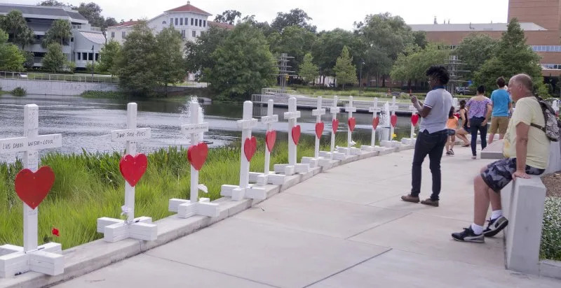 Greg Zanis set up 49 memorial cross in remembrance of the victims of the Pulse nightclub massacre in Orlando, Fla., on June 16, 2016. File Photo by Gary I Rothstein/UPI.
