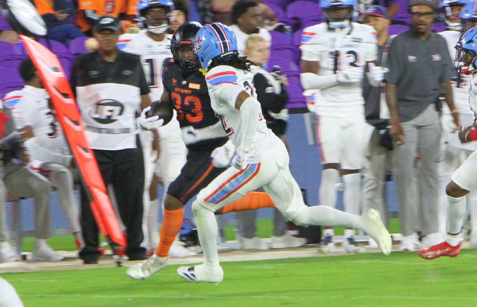 Orlando Storm running back Elijah Dotson is brought down by...