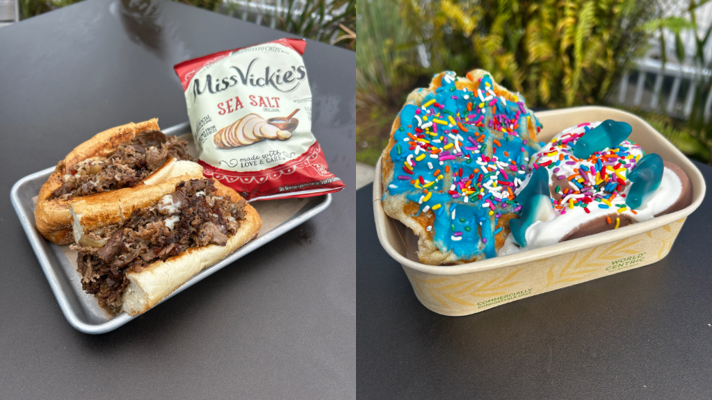 Traditional Philly Cheesesteak Sandwich with shaved rib-eye, cheese sauce, peppers and onions on a warm roll. Then dive into something sweet with the Waves of Wonder Waffle Sundae — hand-dipped waffles topped with sprinkles, gummy sharks, and chocolate-vanilla twist ice cream.