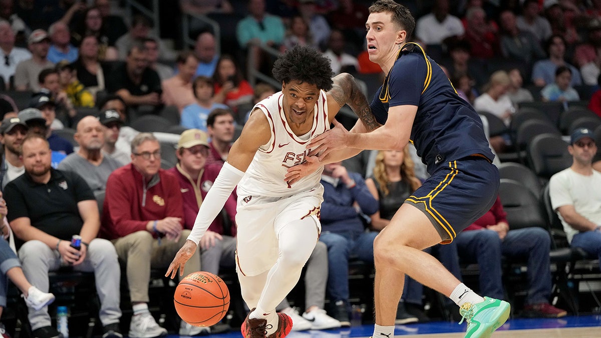 Florida State Seminoles guard Martin Somerville dribbles