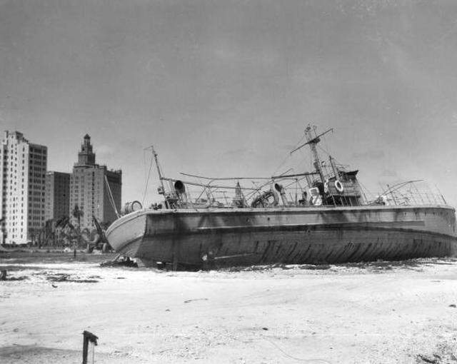 A boat washed ashore along Bayfront Park after the 1926 hurricane.