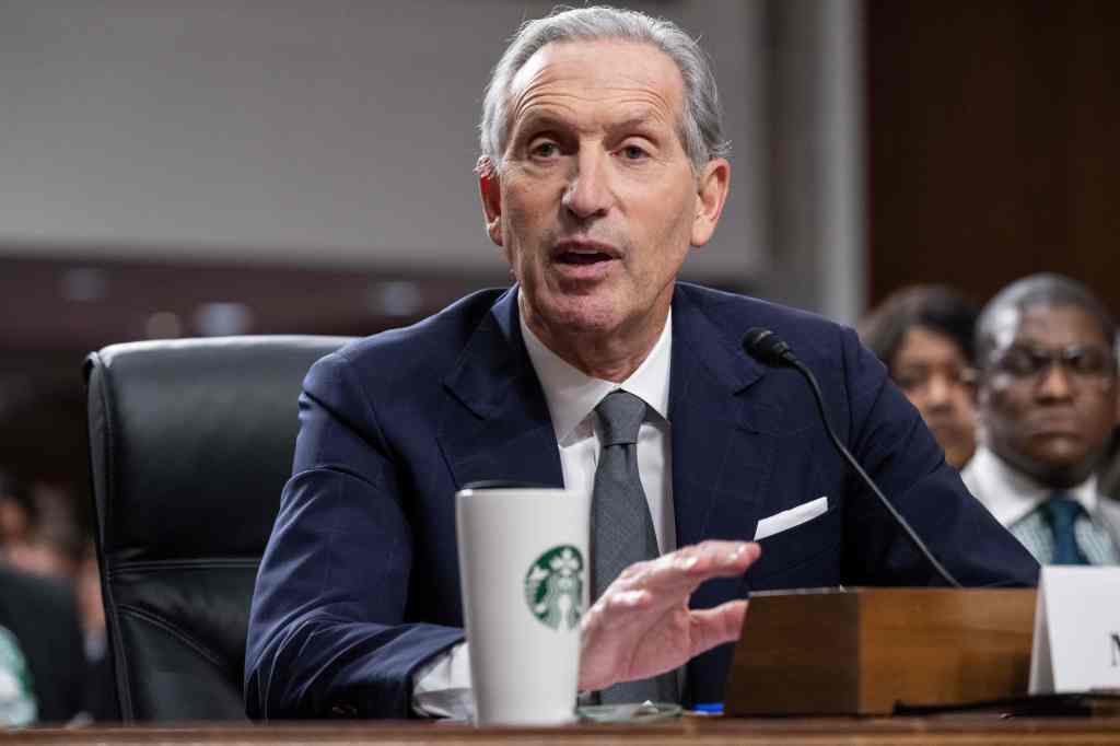 Howard Schultz testifying at a Senate hearing.