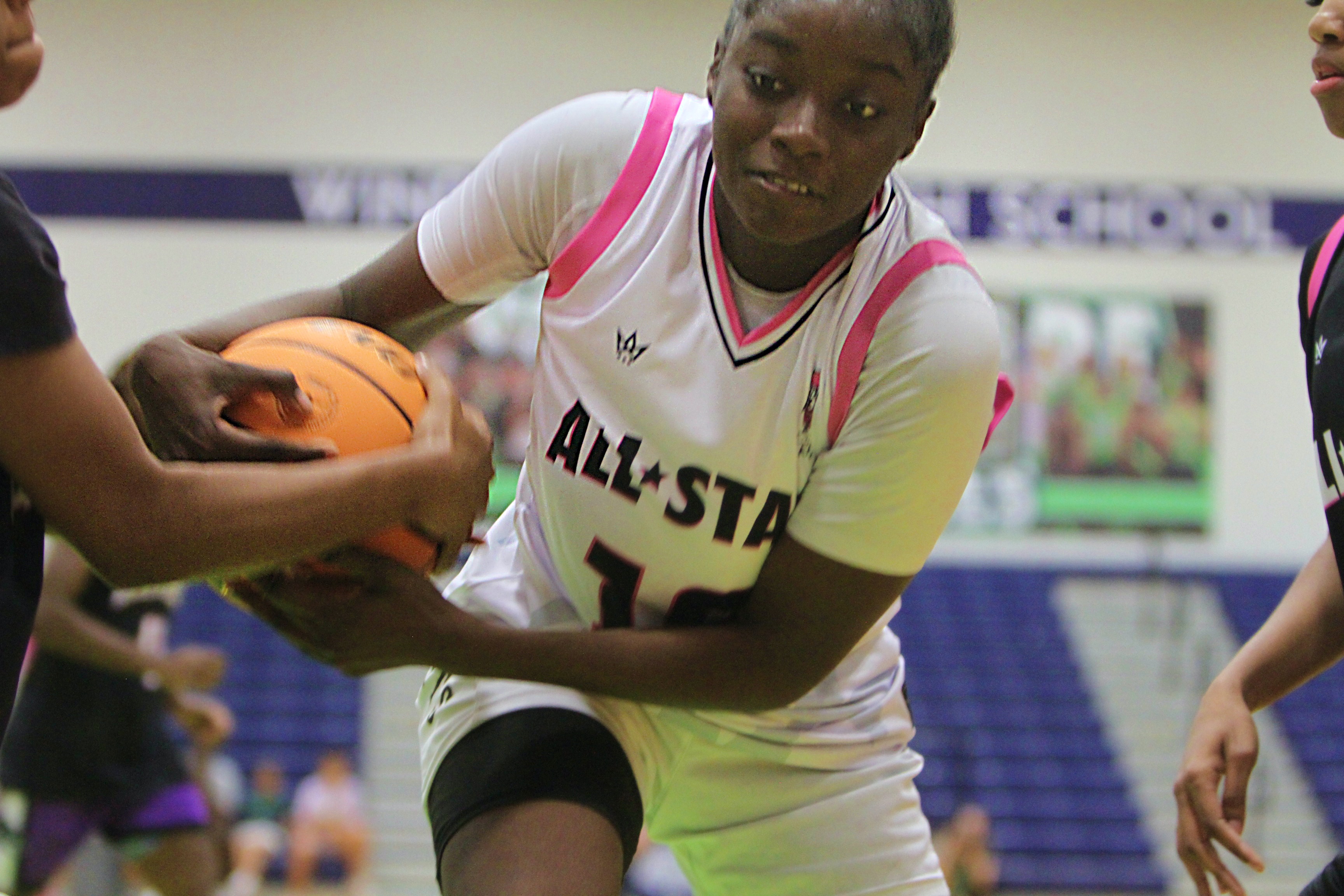Gabby Fortius of Ocoee fights for a loose ball at...