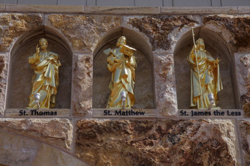 Statues of the apostles on a building at Ave Maria University.