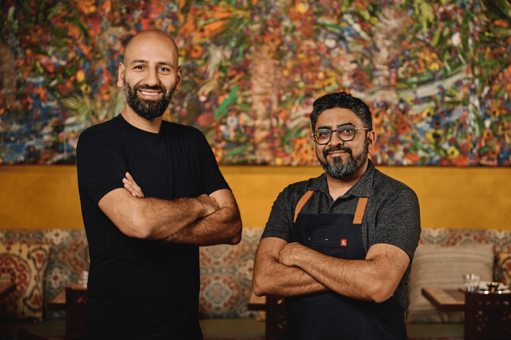 the founders side by side with their arms crossed