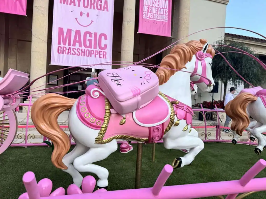 A horse and carriage art sculpture