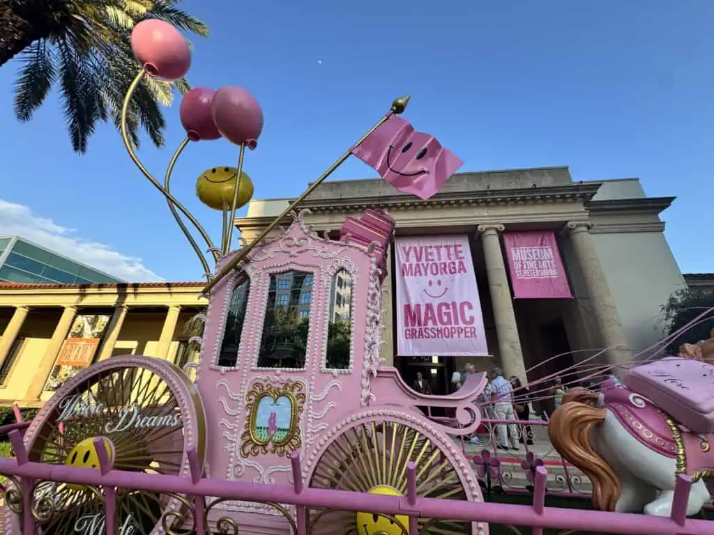 A horse and carriage art sculpture