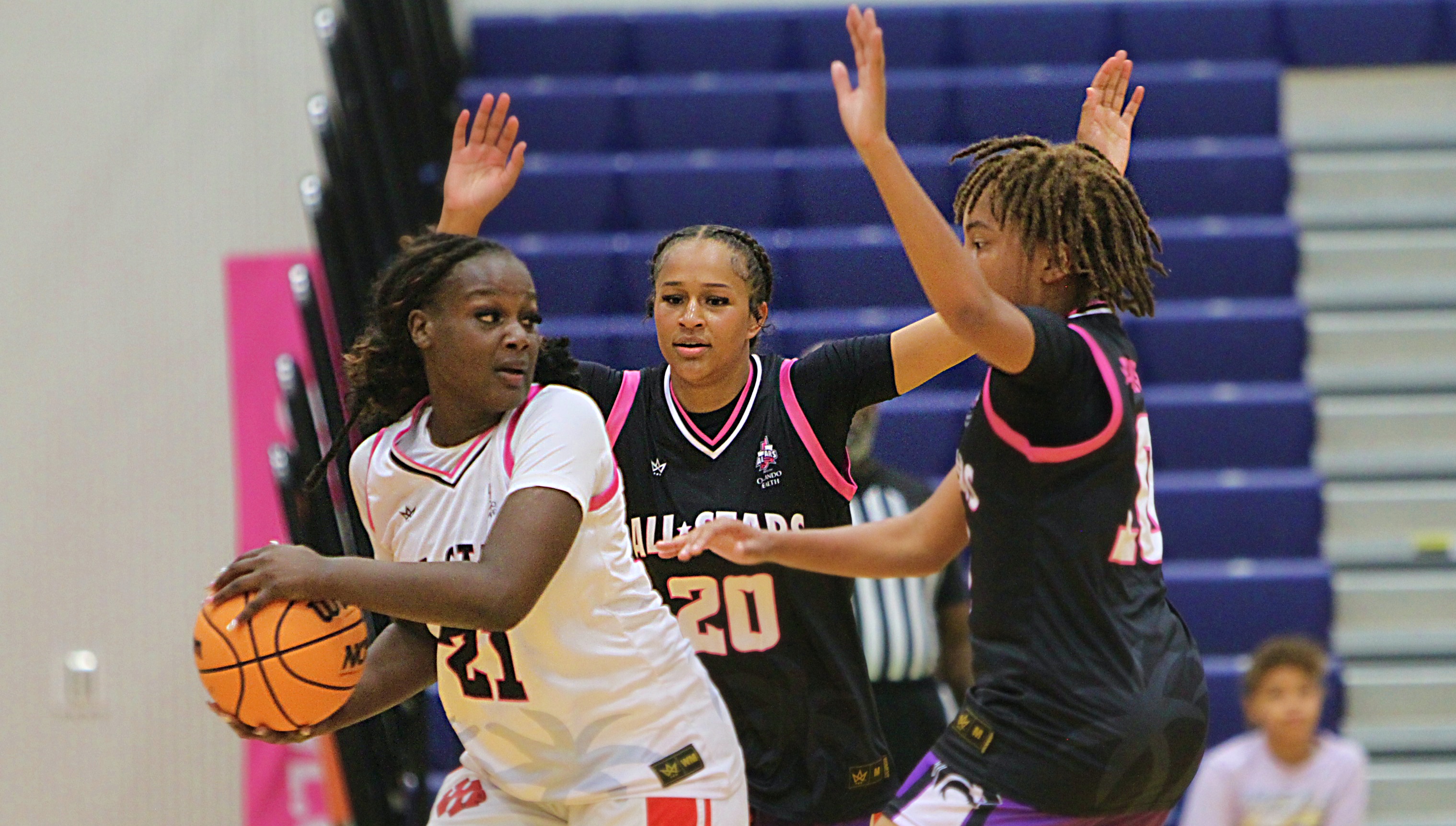 Eryn Griffin (21) of Lake Highland Prep is guarded by...