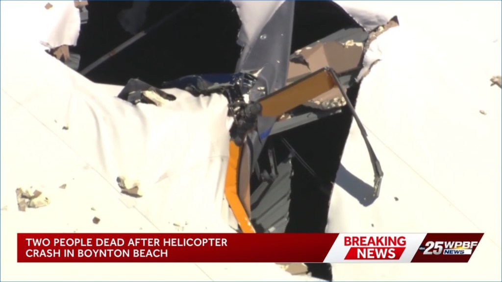 Debris and a collapsed roof after a helicopter crash in Boynton Beach.