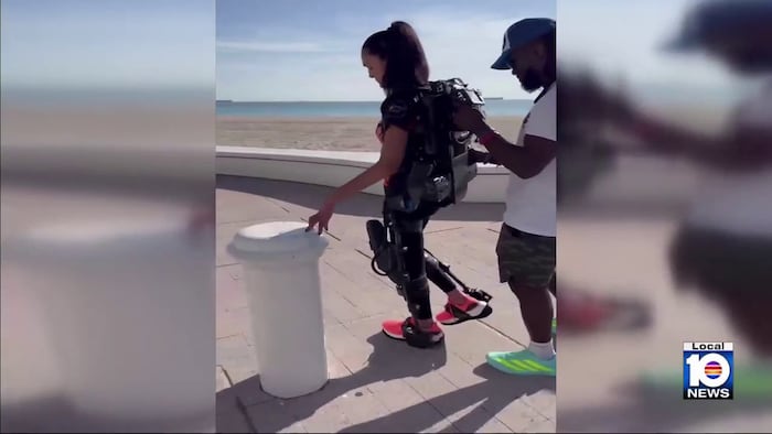 Fort Lauderdale woman overcomes paralysis, walks along beach with robotic suit