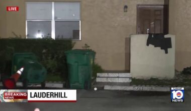 Man taken into custody after firing shots through bathroom door, barricading himself inside home