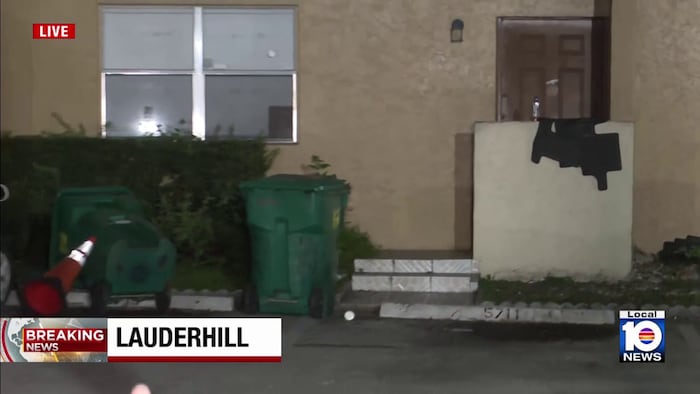 Man taken into custody after firing shots through bathroom door, barricading himself inside home