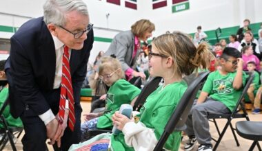 Governor DeWine speaking to a New Miami Elementary School student.