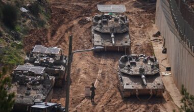 Israeli tanks maneuver near the Israel-Lebanon border, in northern Israel, Wednesday, March 4, 2026. (AP Photo/Ariel Schalit)
