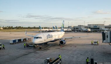 JetBlue aircraft on the tarmac at Fort Lauderdale-Hollywood International Airport at sunrise.