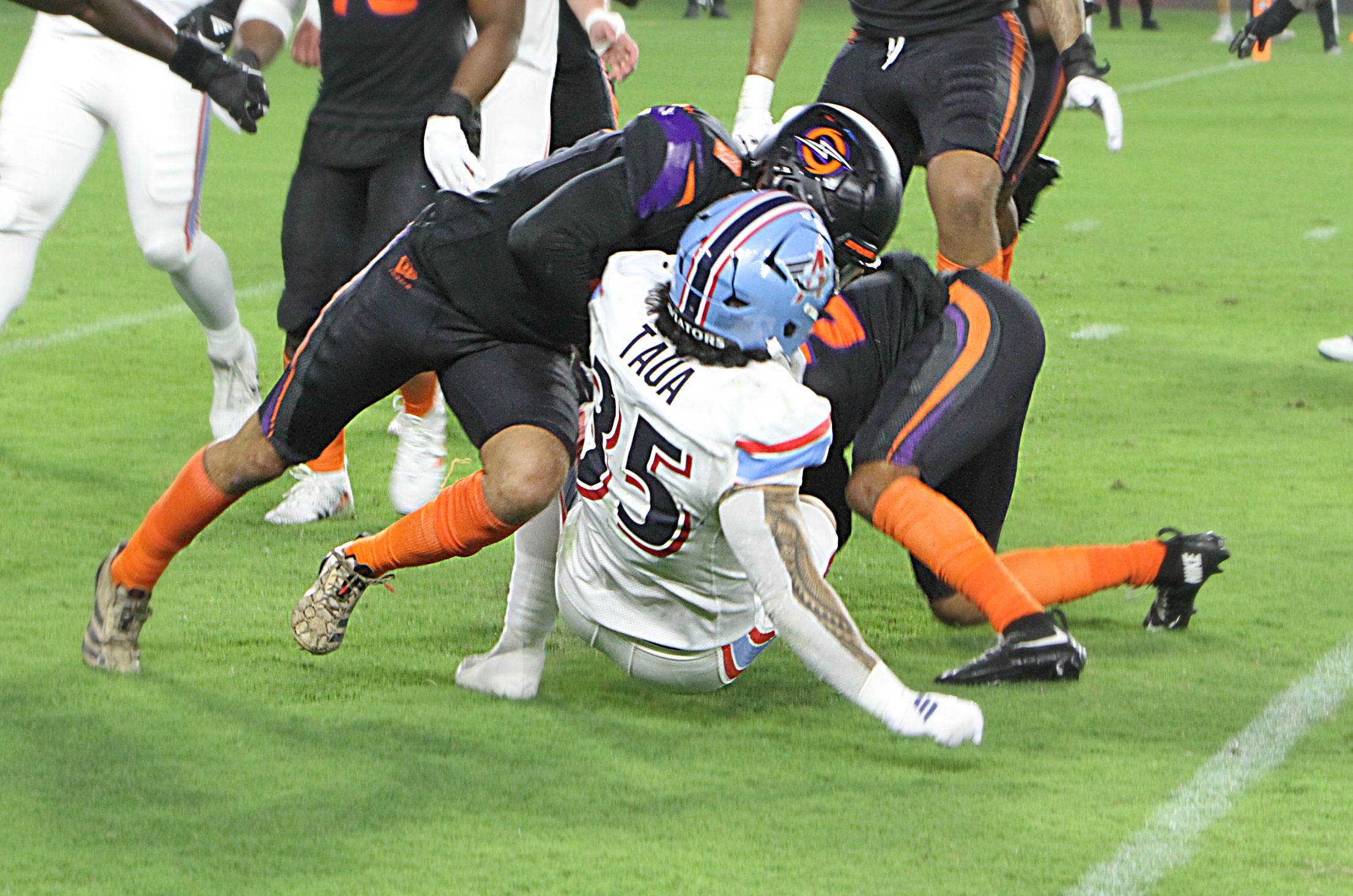 Orlando Storm safety Josh Minkins puts a big hit on...