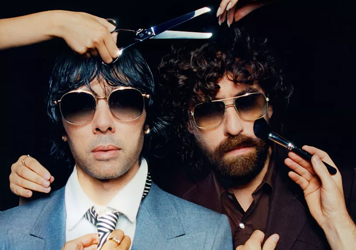 Photo of two men are putting on makeup and getting a haircut