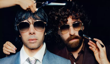 Photo of two men are putting on makeup and getting a haircut