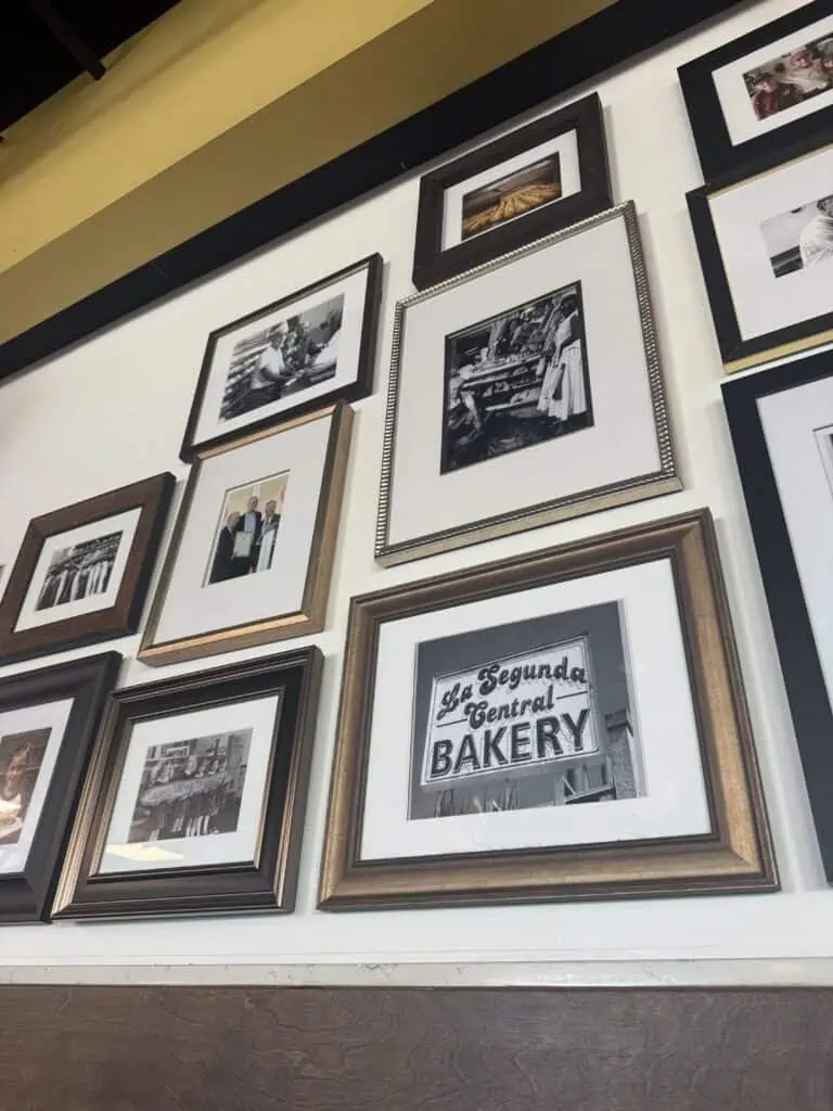 A collection of vintage photos on a wall