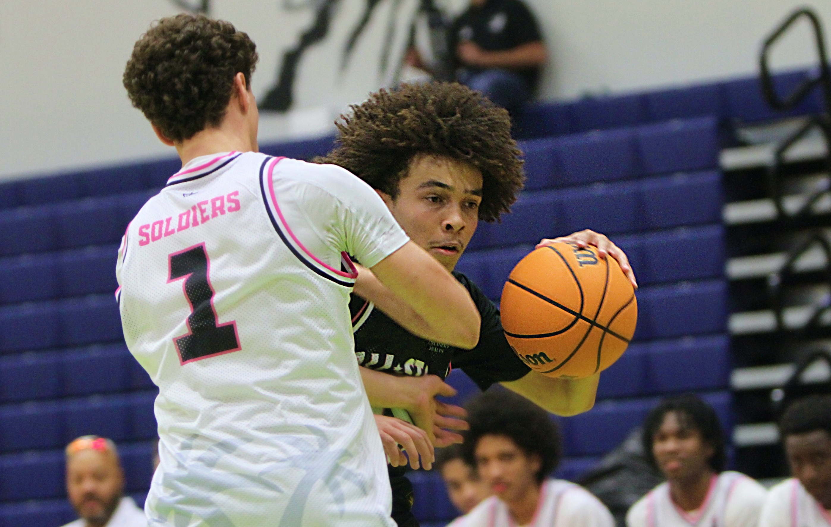 Lucas Boyd of Windermere tries to get around Will Ryan...