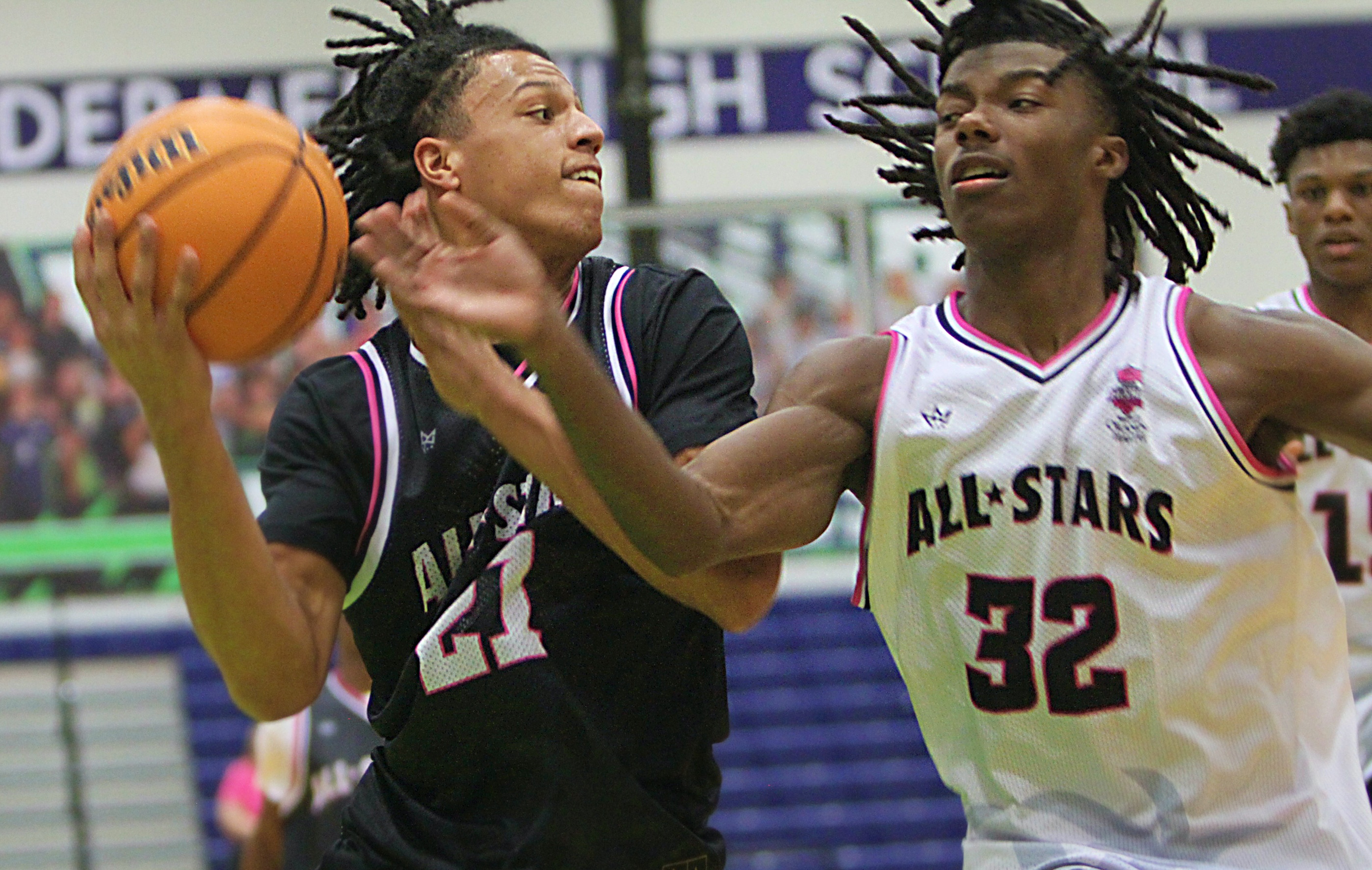 Michael Madeume of Lake Highland Prep of defended by Dylan...