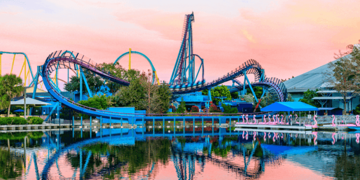 Mako roller coaster against a pink sky at SeaWorld Orlando