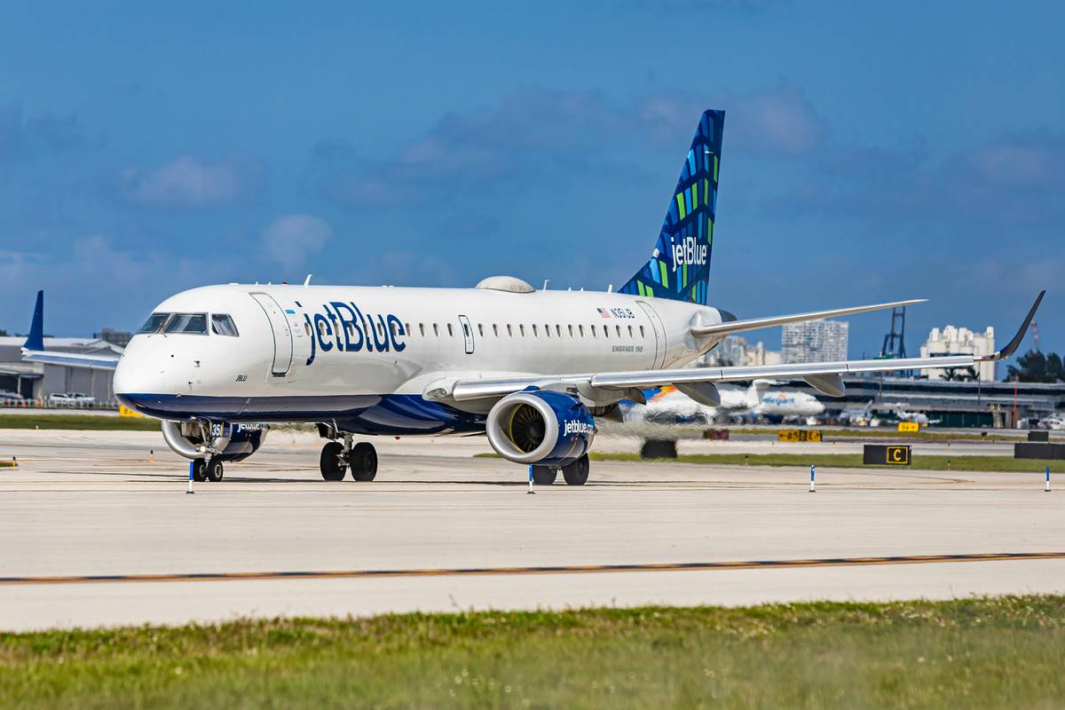 A JetBlue plane on the runway in FLL Airport