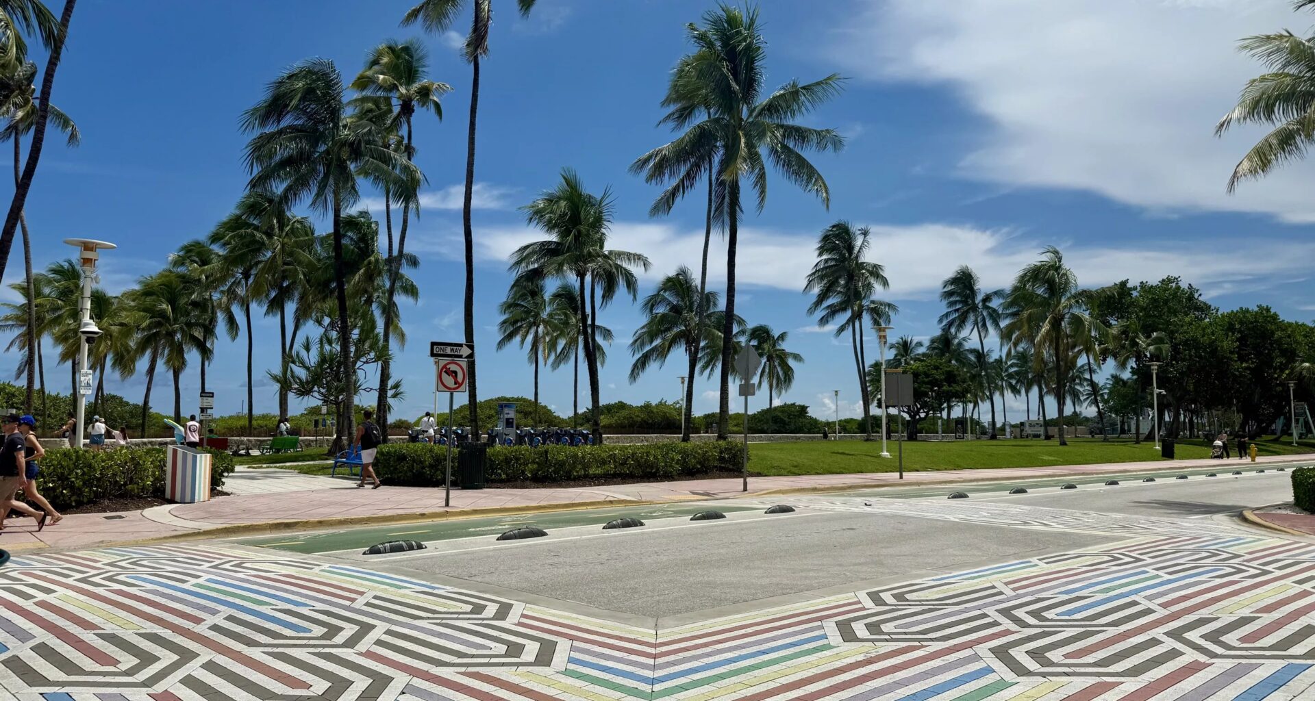 Depicted are rainbow crosswalks at the intersection of Ocean Drive and 12th Street.