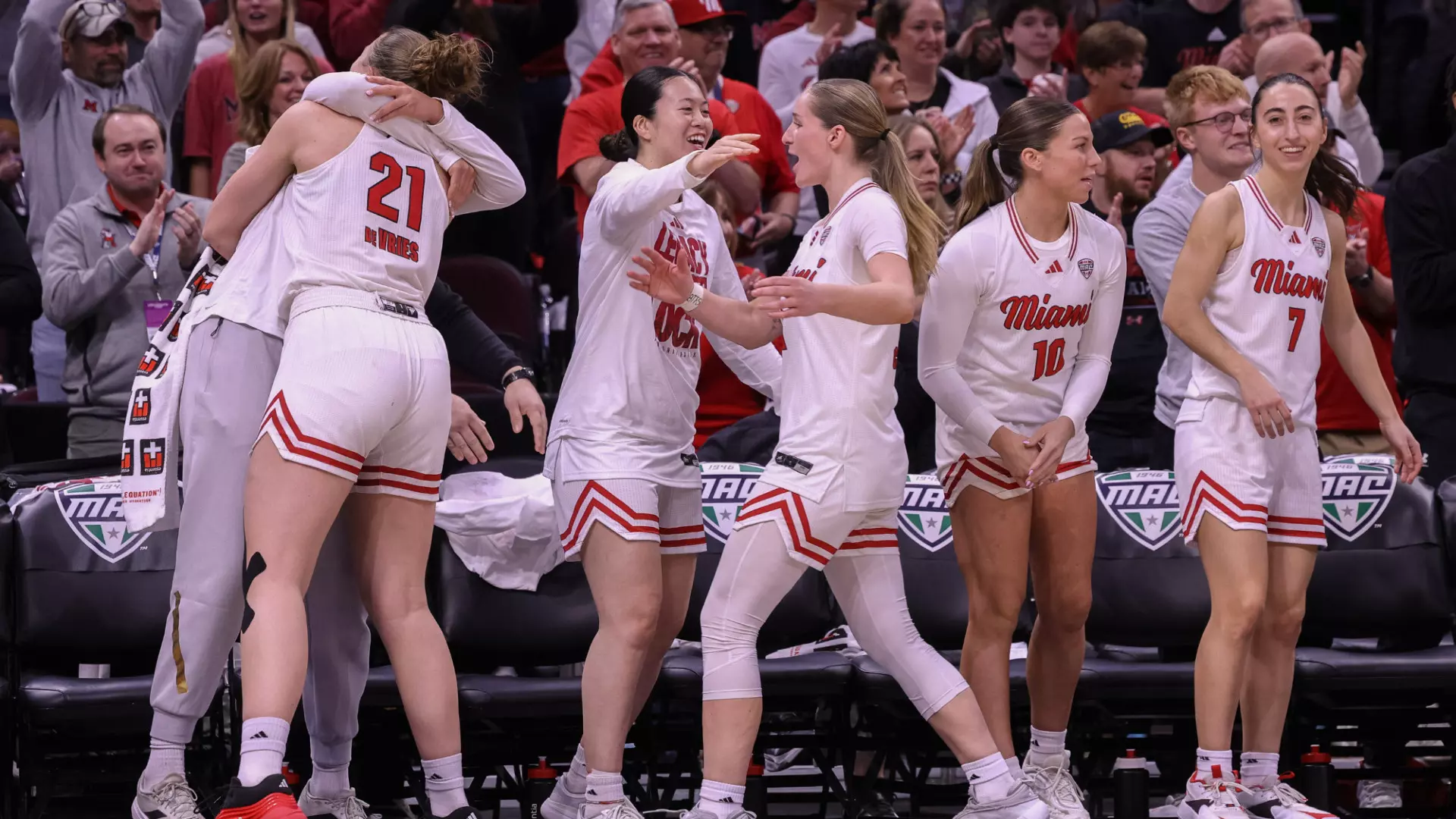 Mio Sakano and Amber Scalia hug