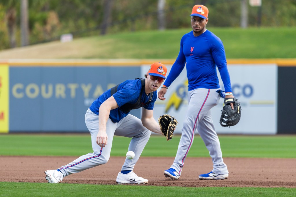 Brett Baty fields a ball at first base as Jorge Polanco looks on during Spring Training at Clover Field, Wednesday, Feb. 18, 2026, in Port St. Lucie, FL. 