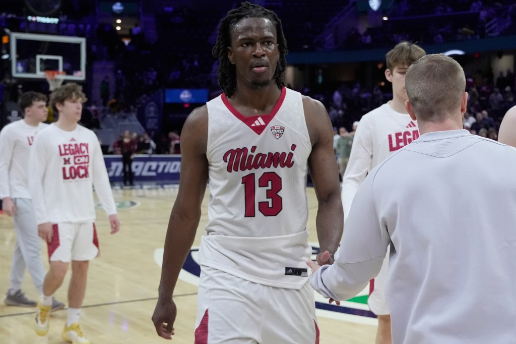 Antwone Woolfolk, a Miami forward, on the basketball court after a game.