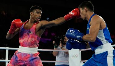 United States' Omari Jones, left, fights Uzbekistan's Asadkhuja Muydinkhujaev in their men's 71 kg semifinal boxing match at the 2024 Summer Olympics, Tuesday, Aug. 6, 2024, in Paris, France. (AP Photo/John Locher)