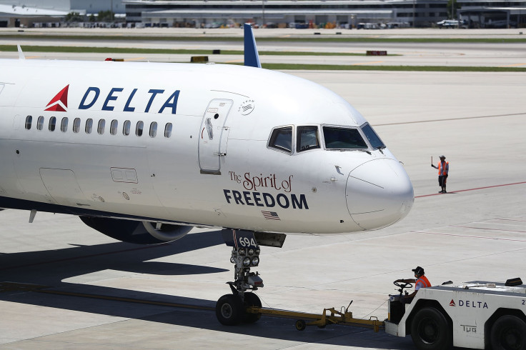 A passenger on a Delta Airlines flight from Detroit, Michigan, to Shanghai, China, was unresponsive. In this photo, a Delta Air Lines plane is seen on the tarmac of the Fort Lauderdale-Hollywood International Airport in Fort Lauderdale, Florida, July 14, 