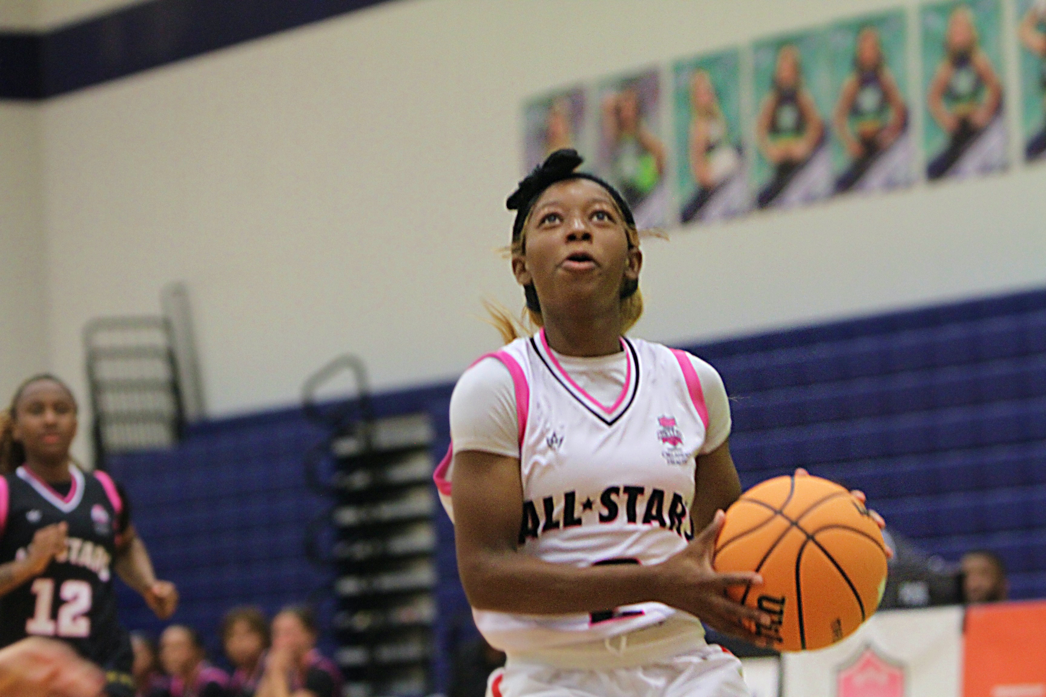 Cherish Risbrook of Colonial drives in for a layup at...