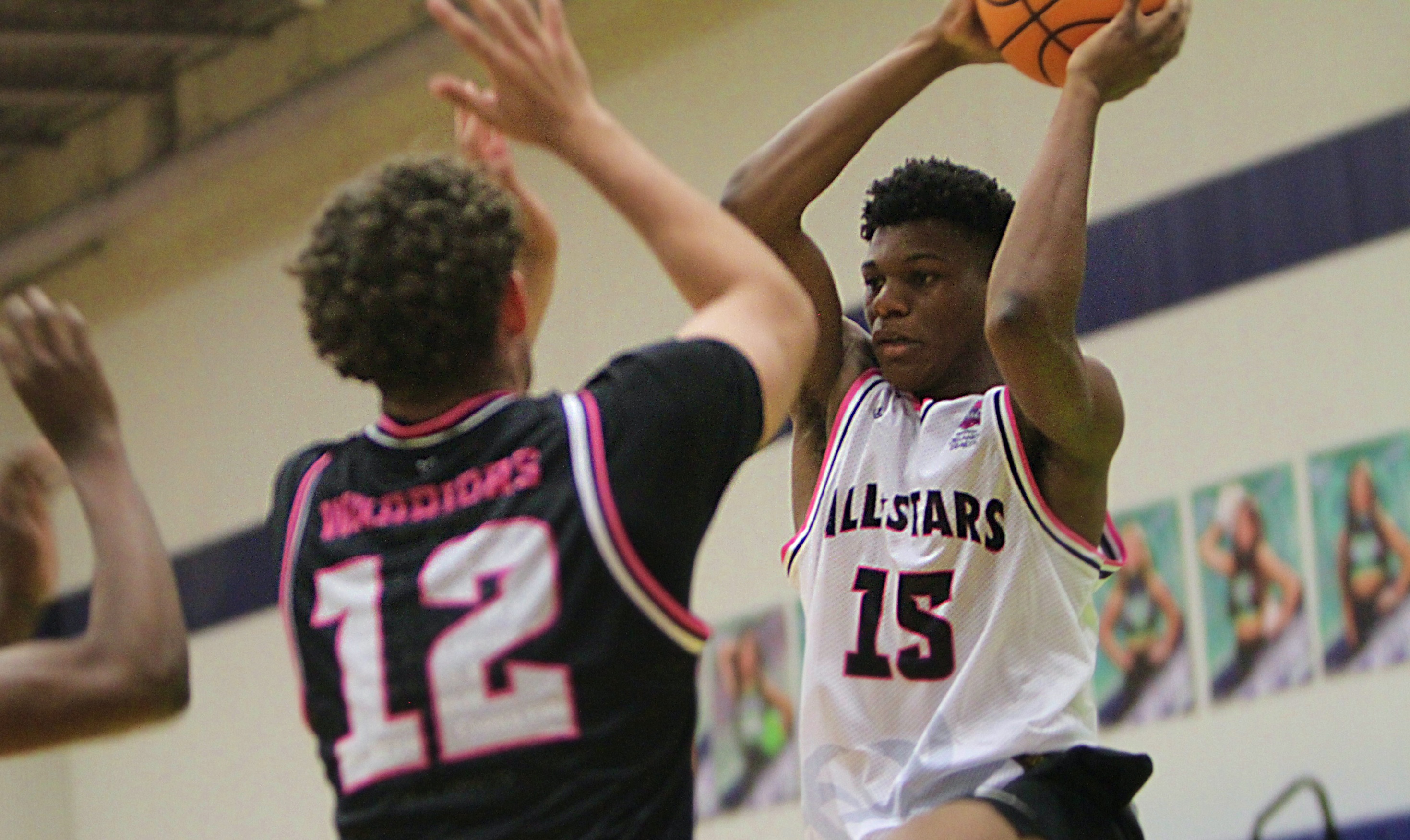 RJ Griffin (15) of Lake Highland Prep is defended by...