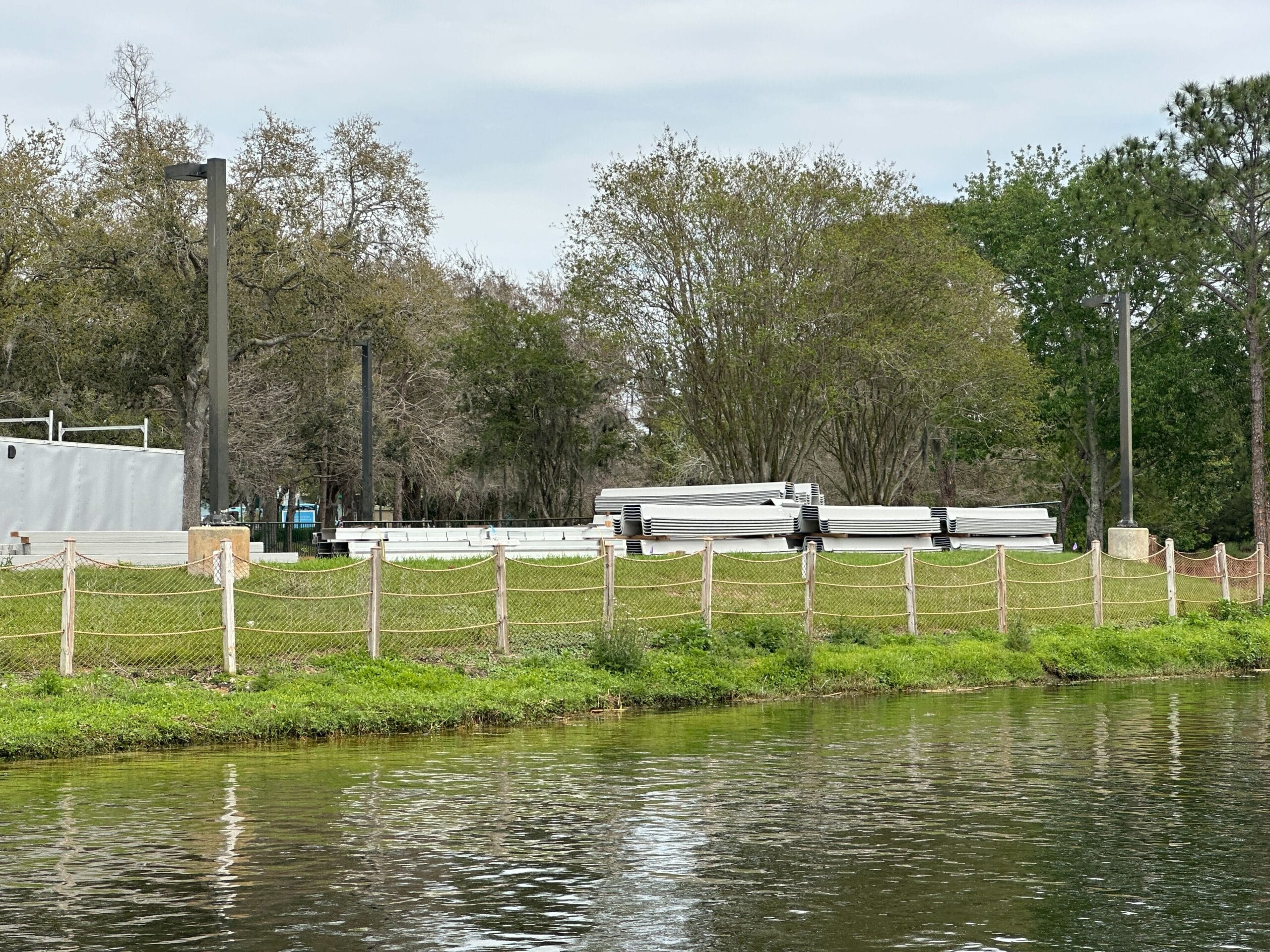 The river, which carries the Sassagoula River Ferry Boat, appears to be getting a new boundary wall along its river banks. Today, while visiting the property, we spotted boundary wall materials stacked beside the riverbank.