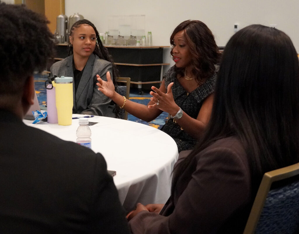 Bar President Rosalyn Sia Baker-Barnes talks with a number attendees at The Florida Bar Young Lawyers Division’s Job & Resource Fair in Ft. Lauderdale.
