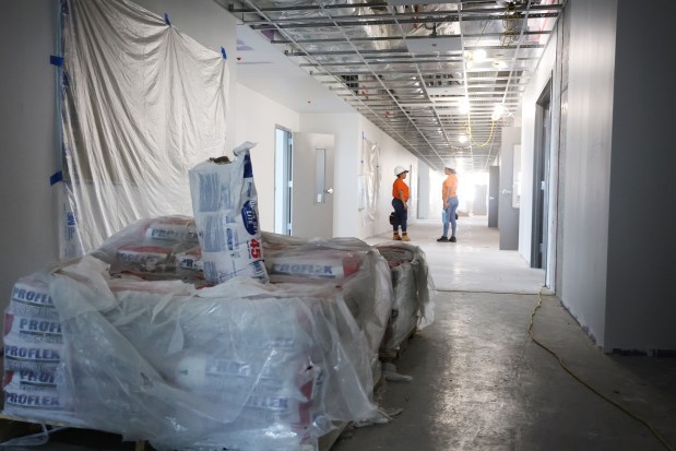 The hallway inside James S. Rickards Middle School in Fort Lauderdale under construction on Thursday, March 19, 2026. Five years after a roof collapse destroyed the campus, completion remains a long way off for the school, which has been in a temporary facility since 2021. (Carline Jean/South Florida Sun Sentinel)