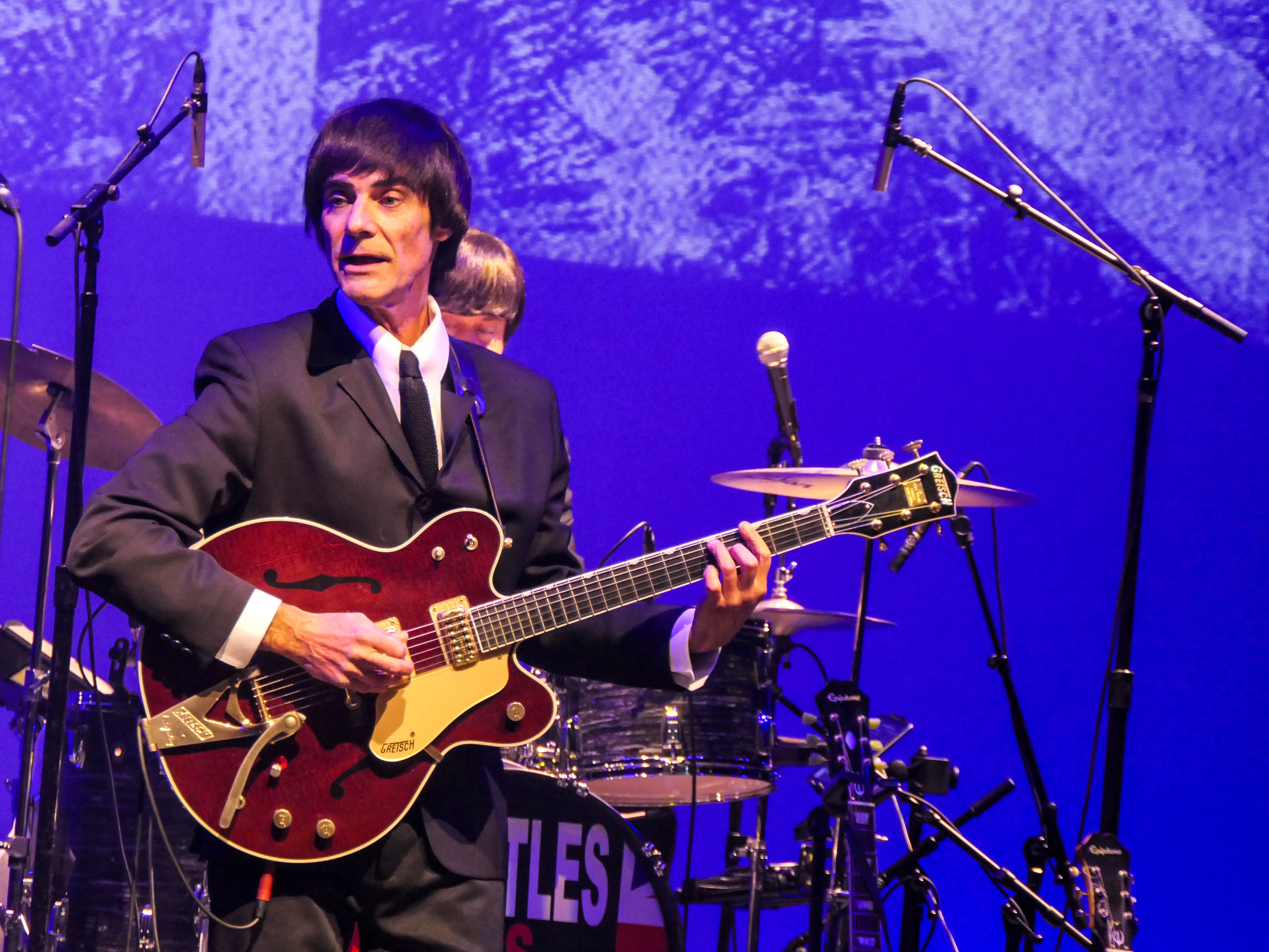 Abbey Road, portraying the Beatles, performs during the 