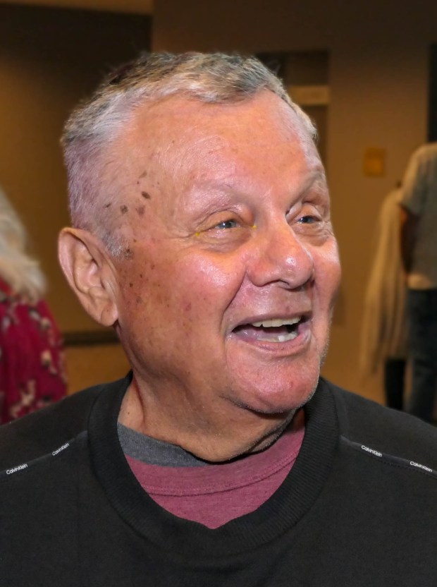 Bill Katz of Boynton Beach speaks with Sun Sentinel reporter Ben Crandell before "Beatles vs. StonesA Musical Showdown" brought its British Invasion battle royale to the Marshall E. Rinker Sr. Playhouse at the Kravis Center for the Performing Arts in West Palm Beach on Wednesday, March 18, 2026. (Scott Luxor/Contributor)