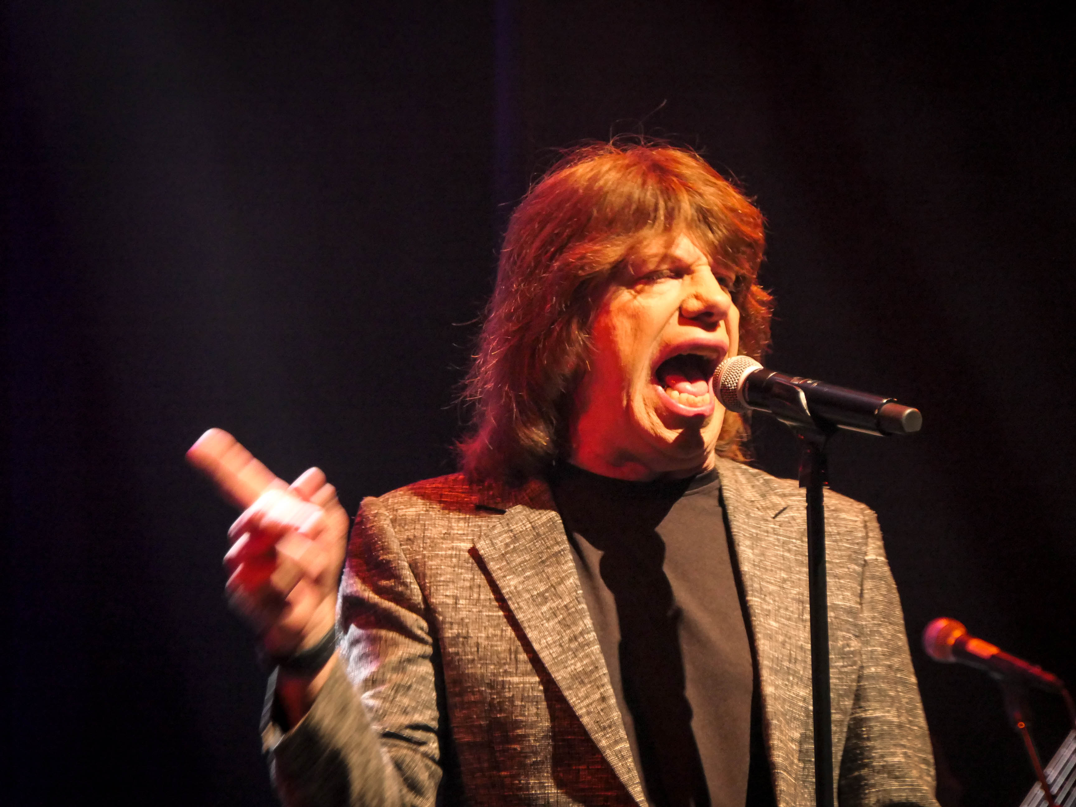 Satisfaction, portraying the Rolling Stones, performs during the 